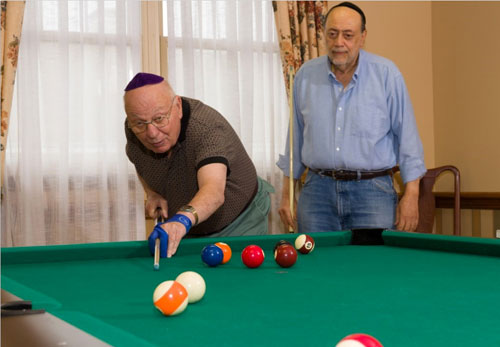 image of senior men playing pool